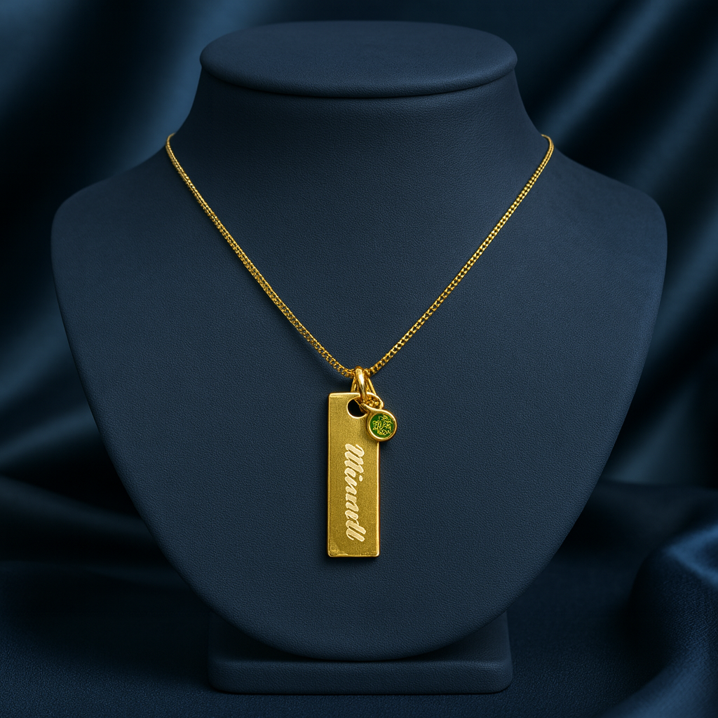 Engraved plate name necklace with green birthstone charm on gold finish—972 sterling silver, customizable chain length.