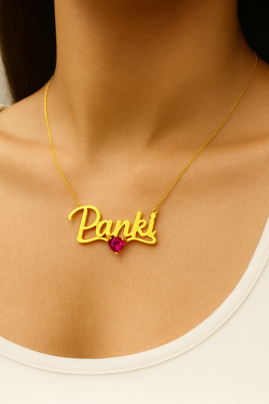 Custom gold name necklace with heart-shaped pink gemstone—handmade 925 sterling silver, customizable chain length, font, and text.