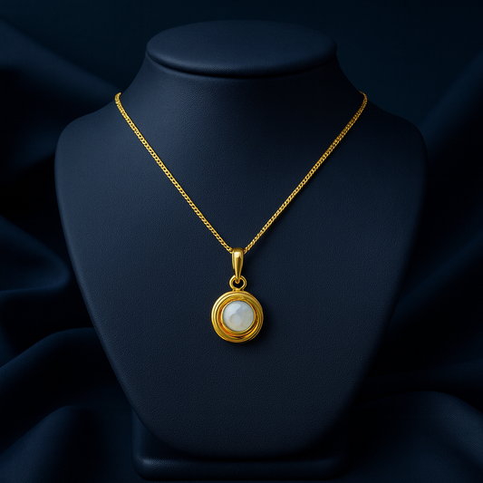 Angel Pearl Necklace in sterling silver with gold finish on model’s collarbone—dainty pearl pendant with customizable chain length.